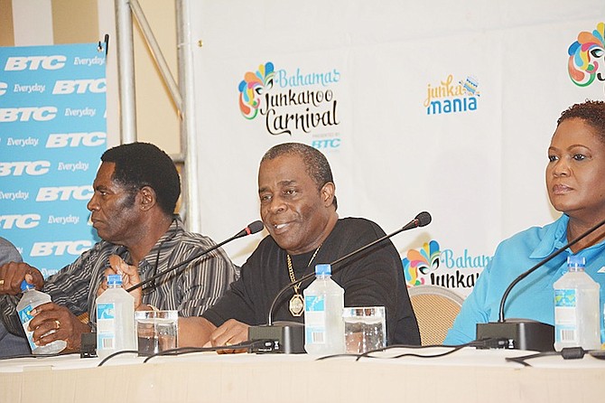 Baha Men founder Isaiah Taylor (centre) speaking yesterday, when he demanded to know who would headline the Bahamas Junkanoo Carnival. Photo: Shawn Hanna/Tribune Staff