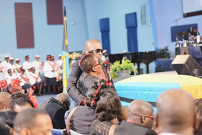 Mourners pay their respects during the full military funeral service for Police Constable 983 Latorio Jerome Demeritte, held at Bahamas Faith Ministries. See page three for the full story. Photo: Shawn Hanna/Tribune Staff

