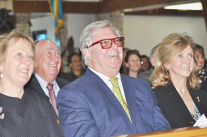 SIR Jack Hayward’s son, Rick, at yesterday’s memorial service, flanked by his wife, Alexandra, right, and his sister, Sue Heath. Photo: Vandyke Hepburn