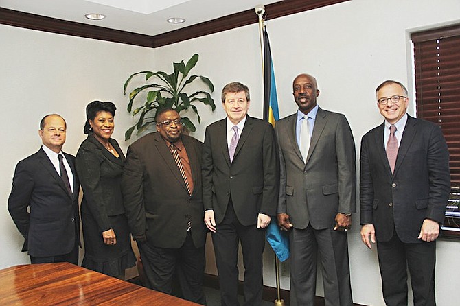 Guy Ryder, Director-General of the International Labour Organization (ILO) with Shane Gibson, Minister of Labour, yesterday at the Ministry of Labour. From left, Christian Ramos Veloz, senior advisor, Office of the ILO; Chanelle Brown, Senior Assistant Secretary, Minister of Labour; Robert Farquharson, Director of Labour, Bahamas; Guy Ryder; Shane Gibson; abd Giovanni di Cola, Director, ILO Decent Work Team and Officer for the Caribbean.  Photos: Raymond Bethel/BIS
