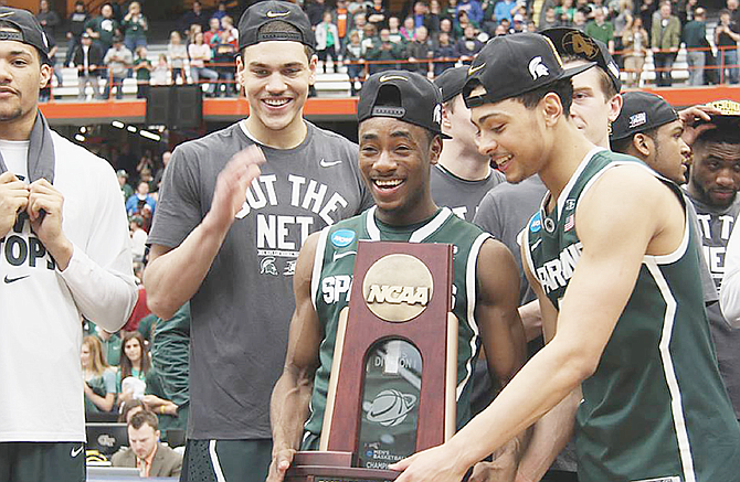 MAKING HISTORY: Lourawls “Tum Tum” Nairn Jr and the Michigan State Spartans won the East Region with a 76-70 overtime win yesterday over the No.3 Louisville Cardinals at the Carrier Dome in Syracuse, New York.
