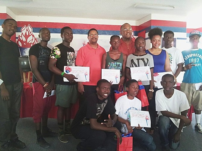 Participants in the FNM Youth Ablaze Talent Explosion pictured with Peter Turnquest and Neko Grant. 