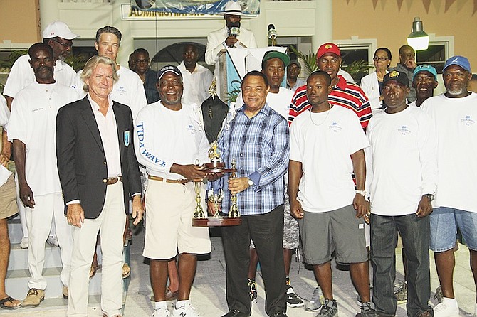 CLASS A WINNERS - the crew of Tida Wave - with Prime Minister Perry Christie.