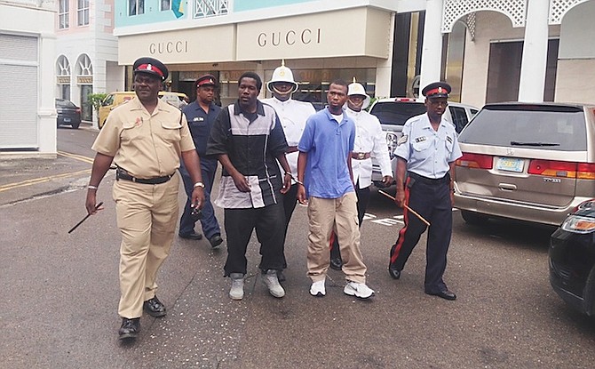 Donald Nottage and Owen McKenzie outside court yesterday.