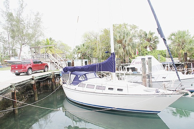 Gary Vanhoeck's boat tied up next to the dock at Stuart Cove’s centre. 
