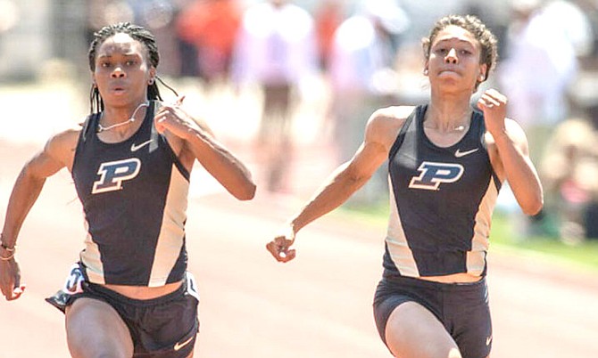 RECORD BREAKER: Devynne Charlton (left) broke Purdue’s 29-year-old record in the 100 metres at the Rankin/Poehlein Invitational on Saturday.