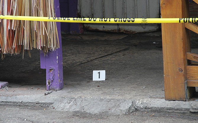 The scene of today's stabbing at Potter's Cay Dock. Photo: Tim Clarke/Tribune Staff