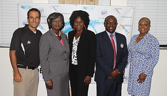 BAF announces Run For Pompey yesterday at the BAF Financial Bahamas headquarters. From left, Kevin Taylor, Virginia Kelly, Pauline Davis-Thompson, BAF Chairman and CEO Chester Cooper and Eldece Clarke-Lewis.