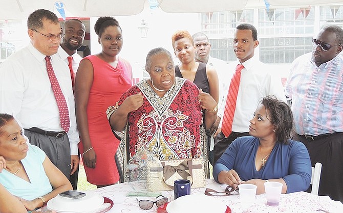 Janet Bostwick, centre, at an FNM lunch on Sunday to mark the 33rd anniversary of her becoming the first woman elected to the House of Assembly. 