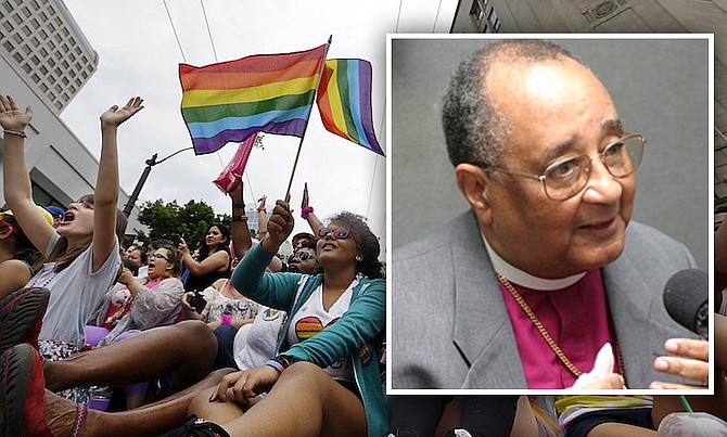 Main picture: Viewers cheer at the 41st annual Pride Parade yesterday in Seattle and (inset) retried Anglican Archbishop Drexel Gomez.