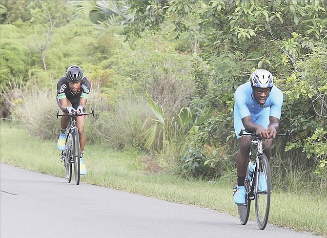 ON THE COURSE: Cyclists compete in the Bahamas Cycling Federation Time Trials on Saturday.
Photo by Tim Clarke/Tribune Staff