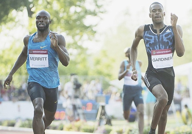GOLDEN RUN: Steven Gardiner comes from behind to pull off a huge victory over reigning American world champion LaShawn Merritt (left) in the 400 metres yesterday at the Hungarian Athletics Grand Prix in Budapest, Hungary.
