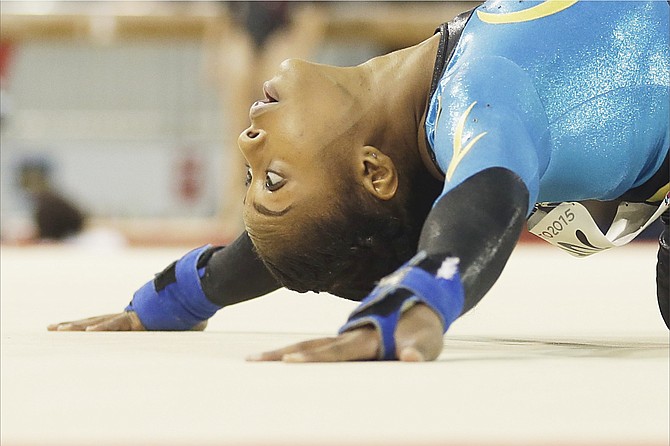 GYMNAST Kianna Dean, of the Bahamas, performs the floor exercise during women’s artistic gymnastics team competition in the Pan Am Games yesterday in Toronto. (AP)