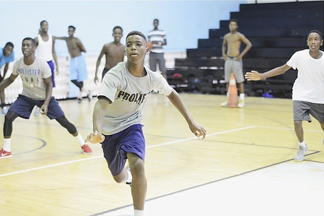 YOUNG CAMPERS take part in the 10th annual edition of the Kevin Johnson Developmental Basketball Camp at the CI Gibson Gymnasium yesterday.
Photos by Shawn Hanna/Tribune Staff
