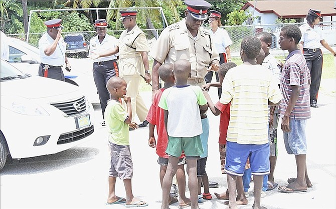 The Royal Bahamas Police Force conducted a walkabout in the Nassau Village area on Monday, handing out safety tip flyers and speaking to residents and business onwers about keeping the community safe.
Photo: Tim Clarke/Tribune Staff