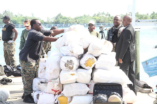 The seized drugs are offloaded in Nassau this morning. Photo: Tim Clarke/Tribune staff