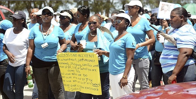 BAHA MAR workers during a march in support of Sarkis Izmirlian - but the effects of the resort’s uncertain future are also reaching other businesses. 