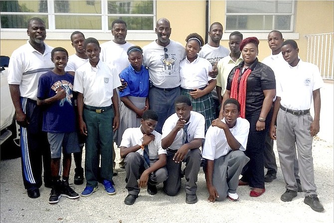 Students in the Simpson C Penn Mentoring Programme with Managing Administrator Kendra Bowe, Founder Simpson C Penn, Pastor Dave Burrows and fellow teachers.