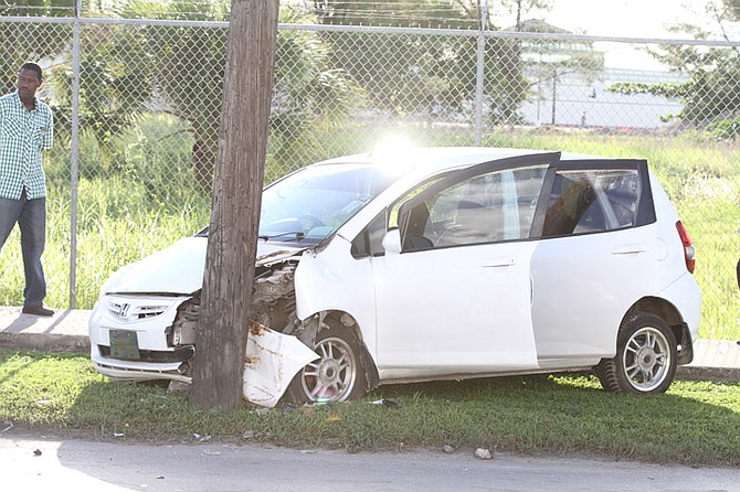 The crashed vehicle at the scene of the police shooting at Balfour and Claridge Roads early on Sunday morning. Photo: Tim Clarke/Tribune Staff