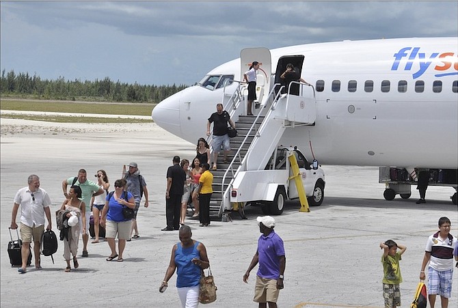 Freeport - The Ministry of Tourism welcomes visitors who faced a diversion to Nassau after the plane they were travelling on was diverted because it would have landed after the end of the air traffic controller’s shift in Grand Bahama. Photo: Vandyke Hepburn/BIS