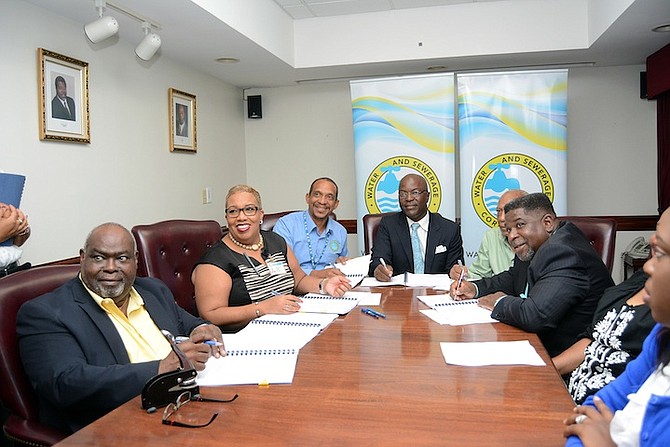 FROM LEFT" Sidney Campbell, Attorney; Cheri Hanna, Assistant General Manager/HR, WSC; Glen Laville, General Manager, WSC; Bishop Lester M. Cox, Chairman of WSC; Keith Archer, Government Consultant and Dwayne Woods, Union President. 