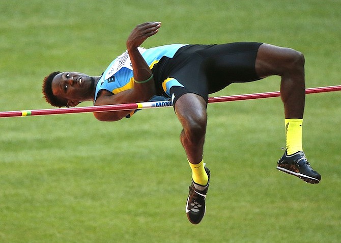 Donald Thomas competes in the men’s high jump qualification at the World Athletics Championships at the Bird's Nest stadium in Beijing. (AP)