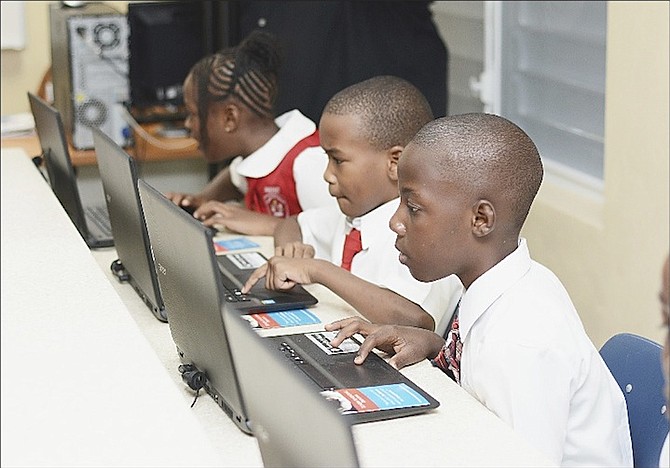 Students using the laptops in the new computer lab at EP Roberts Primary School. 