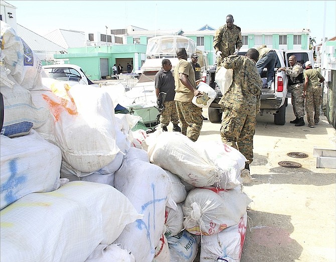 Drugs seized earlier this year after a joint operation being unloaded by members of the Royal Bahamas Defence Force. 