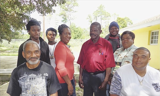Dr Joseph Lindsay (centre, in red shirt) and his crop production class. Seated from left are Sterling Symonette and Paul Major. Standing from left are Romeo Josey, Marina Newton, Dr Lindsay and Sheri Horton. Back row from left are Shadrick Farrington and Montez Hopkins.
