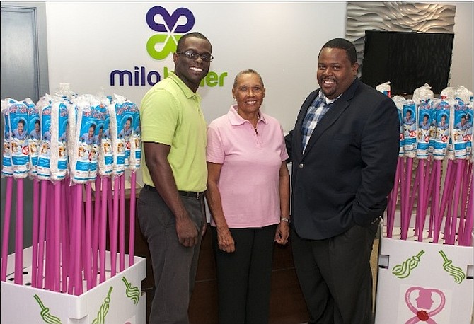 Pictured at the launch of ‘Project Pink Mop’ are Kent Forbes, brand manager at Milo Butler; Andrea Sweeting, president of Sister Sister, and Franklyn Butler, managing director of Milo Butler. 
Photo/Derek Smith Jr/Windward Public Relations