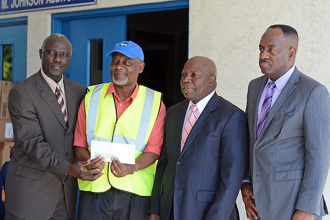 (L-R) Bishop Joseph Smith, National Treasurer and Senior Pastor of Independence Church of God; Luke Bethel, Operations Officer of NEMA; Bishop Carlton Stuart, National Secretary and Senior Pastor of East Street Cathedral and Bishop Moses Johnson, Church of God National Overseer and Administrative. 
Photo Shawn Hanna