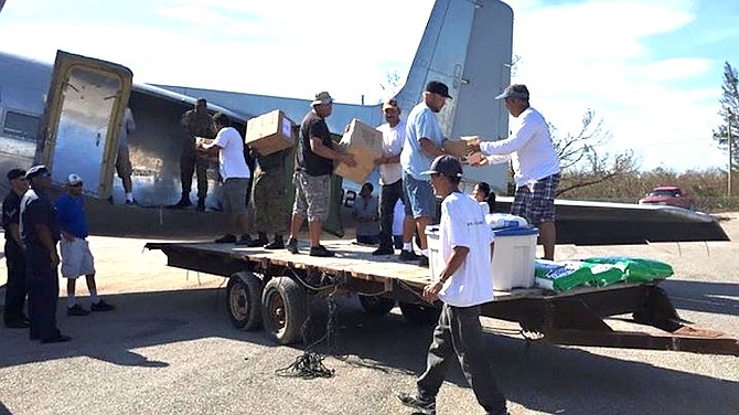 Supplies being unloaded in Deadman's Cay, Long Island this morning.