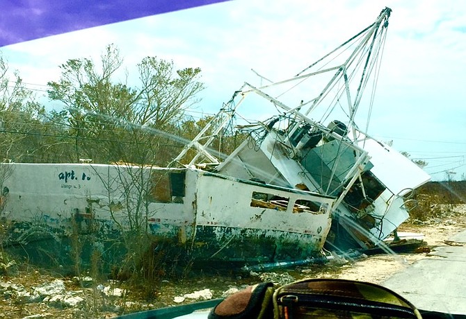 Captain Ryan's fishing boat destroyed in Salt Pond, Long Island. The boat was tied with four 200lb anchors and still ended up on the other side of the street smashed to bits. Long Island's fishing fleet has been decimated by Hurricane Joaquin. 