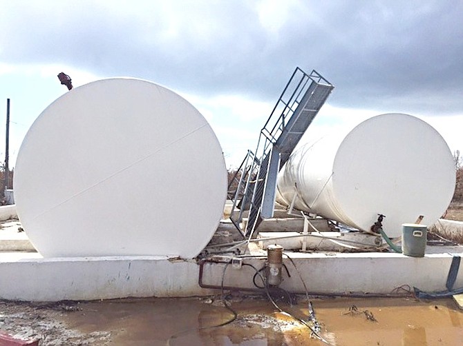 The two BEC 25,000 gallon fuel tanks on Crooked Island dislodged by the force of Hurricane Joaquin.