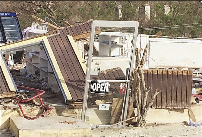 The remnants of a store on the way south to Gordon’s in Long Island, with the 'Open' sign still showing. 