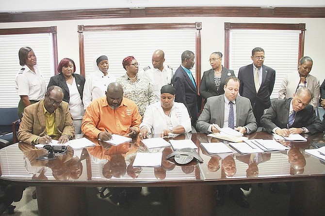 The Public Hospital Authority signed two five-year agreements with the Bahamas Nurses Union yesterday. 
Photo: Tim Clarke/Tribune Staff