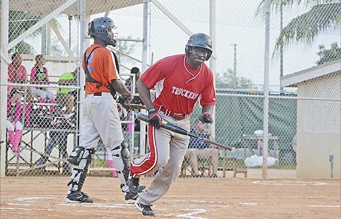 OPENING WIN: The Commando Security Truckers defeated the Brokell Construction Cougars 9-2 last night as the Bahamas Softball Federation’s 43rd National Softball Championship got underway in the Banker’s Field at the Baillou Hills Sporting Complex.   Photo by Shawn Hanna/Tribune Staff