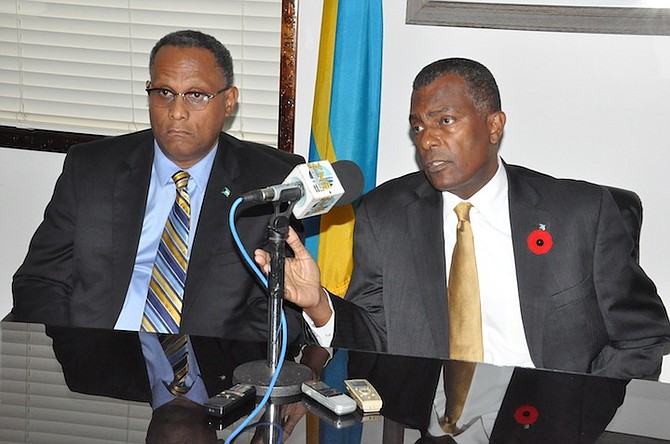 FOREIGN Affairs and Immigration Minister Fred Mitchell and Grand Bahama Minister Michael Darville at the Ministry for Grand Bahama on Friday.