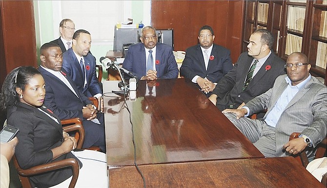 Renward Wells (second left) joined the Free National Movement in 2015 and met leader Hubert Minnis and senior members of the party after he crossed the floor of the House of Assembly.
Photo/Yontalay Bowe