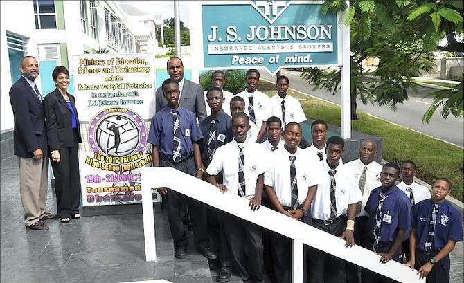 Last year’s GAAA 'National Tournament of Champions' winning team, C V Bethel, pose outside J S Johnson Insurance Ltd with (left to right) Robert Bartlett, Senior Manager, J S Johnson Insurance Ltd; Stephanie Hanna, Public Relations and Administrations Manager, J S Johnson Insurance Ltd; Evon R Wisdom, Head of the Sports Unit, Ministry of Education, Science and Technology; and the C V Bethel coach, Kevin Edgecombe. Photo: Edgar Arnette. 