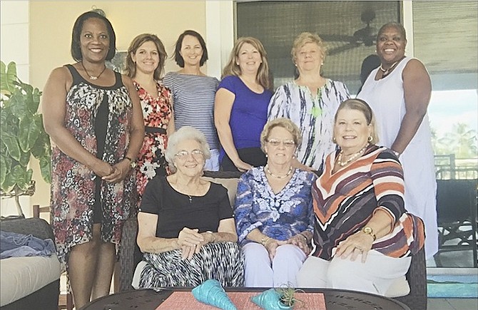 The American Women’s Club in The Bahamas board of directors (from left to right, standing) Alison Bethel McKenzie, Calliope Couchell, Lisa Johnson, Colleen Lowe, Patricia Breen-Giancola and Cassandra Price. Seated (from left) Cally Maillis, Joan Pinder and Fay Sands.

