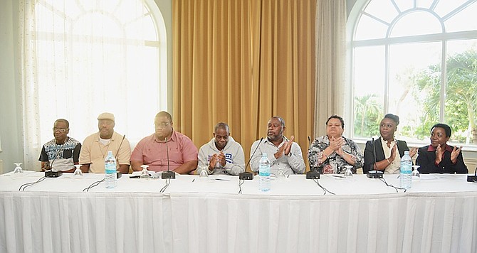 From left, Ira Storr of The Spank Band; Geno D; Denzil Rolle; Isaiah Taylor, of the Baha Men; BJ Moss, of Acklins Trade and Development Association; Gina Burrows-Coakley, of the Long Islanders’ Development Association; Tejada Sands, of San Salvador Development Association; Deborah Ferguson, of Crooked Island Development Association and Falcon Watson, of The Falcon Entertainment, at the announcement of the concert to help those affected by Hurricane Joaquin. 
Photo: Shawn Hanna/Tribune Staff