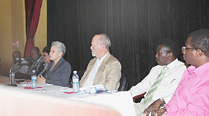 A Town Meeting was held on Monday evening to discuss the proposed upgrade to Potter’s Cay at the National Centre for the Performing Arts, Shirley Street. Pictured are Minister of Transport and Aviation Glenys Hanna Martin (at the table, fourth right), and Montagu MP Richard Lightbourne (third right).  Photos: Raymond A. Bethel, Sr/BIS