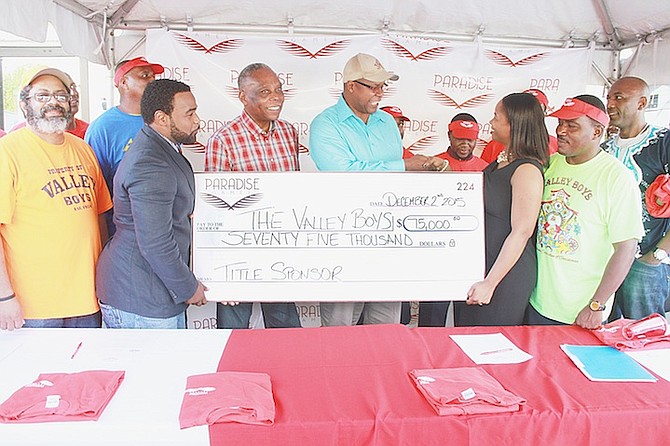 Paradise Games partnered with the Valley Boys group yesterday for the next five years and presented the group with a $75,000 cheque towards the upcoming Boxing Day and New Year’s Day Junkanoo Parades.
Photo: Tim Clarke/Tribune Staff