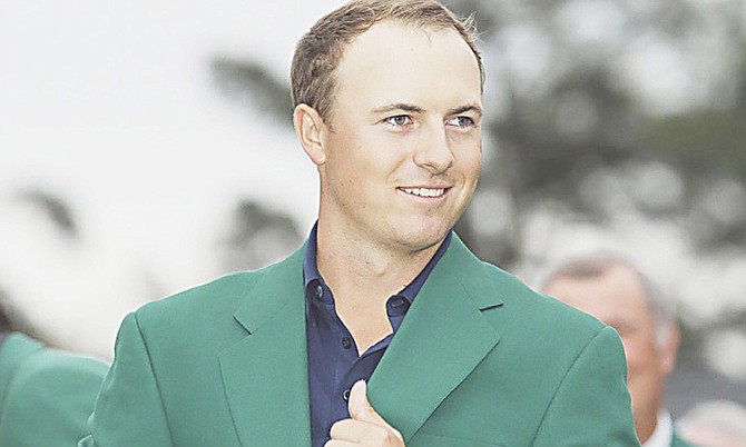 Jordan Spieth wears his green jacket after winning the Masters golf tournament  on April 12, 2015, in Augusta, Ga. The 22-year-old and a number of other top-ranked golfers in the world are all set to tee off today in the 2015 Hero World Challenge at the Albany resort. (AP)