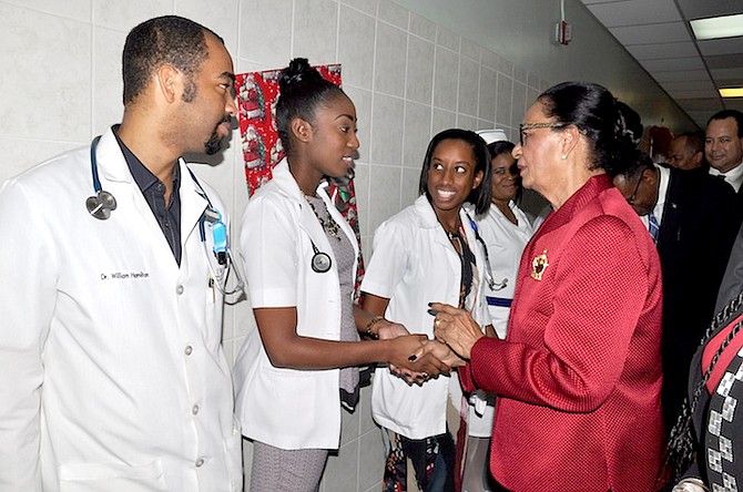 Governor General Dame Marguerite Pindling meets staff at the Rand Memorial Hospital on Friday.
Photo: Vandyke Hepburn/BIS