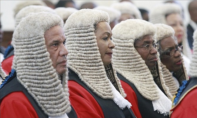 Among those attending the start of the legal year ceremony yesterday were Senior Justice Stephen Isaacs, left, and Justice Vera Watkins, second left.