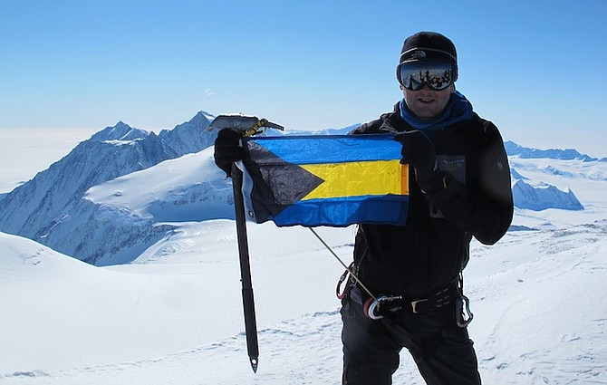 Richard Beek unfurls the Bahamian flag at the top of Mount Vinson, the highest mountain in Antarctica, becoming the first Bahamian to climb the 16,067ft peak, which is 600 miles from the South Pole. 