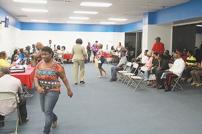 NHI registration started on Monday and Bahamians came out in good numbers at the Town Centre Mall location to get an early jump on signing up.Photo: Tim Clarke/Tribune Staff