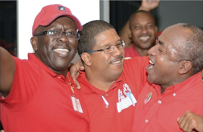 Peter Turnquest, centre, amid the celebrations as he was elected deputy leader of the FNM in November 2014. Yesterday, he said he is not worried by a potential challenge. 